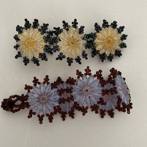 Set of two hand beaded adjustable flower bracelets